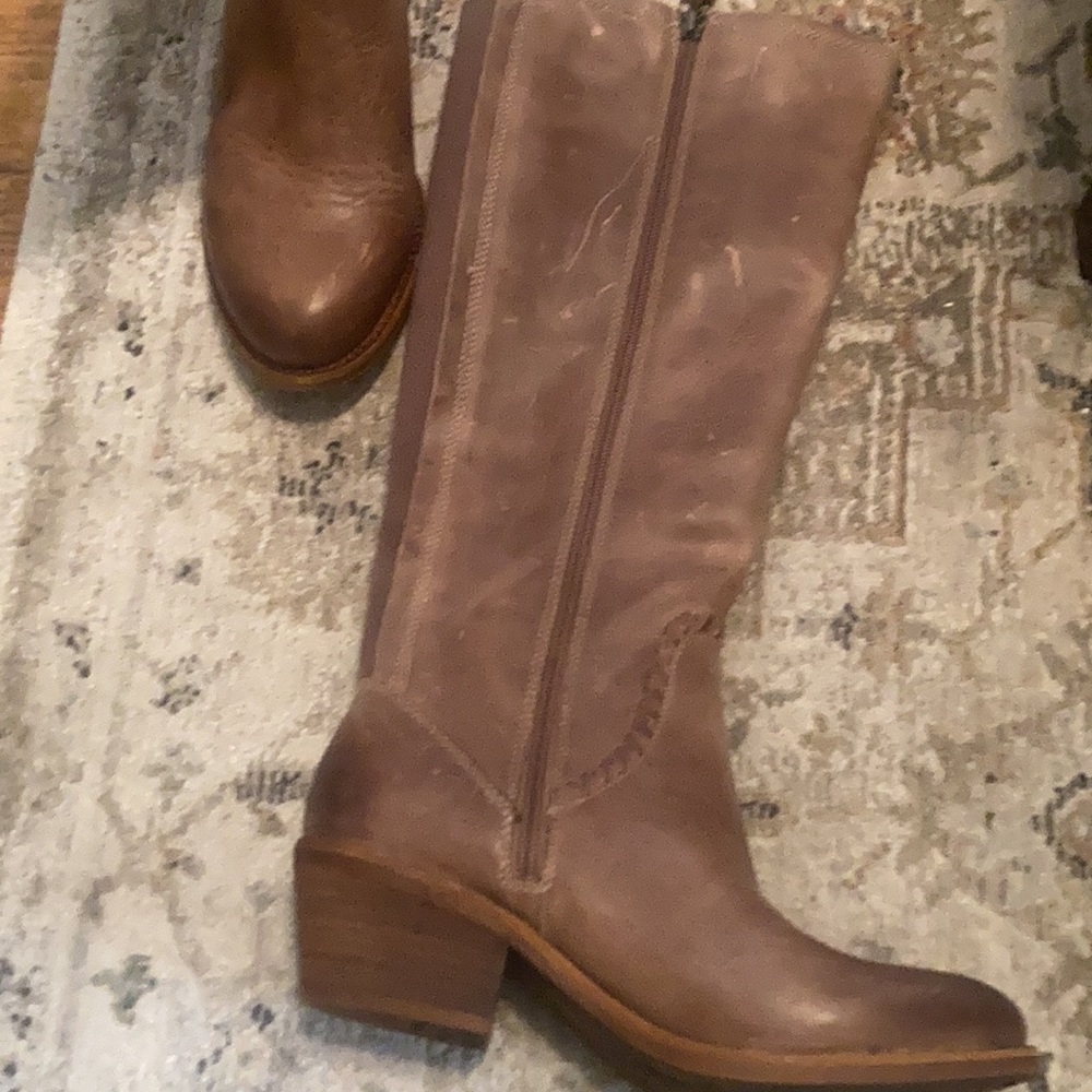 Distressed brown boots